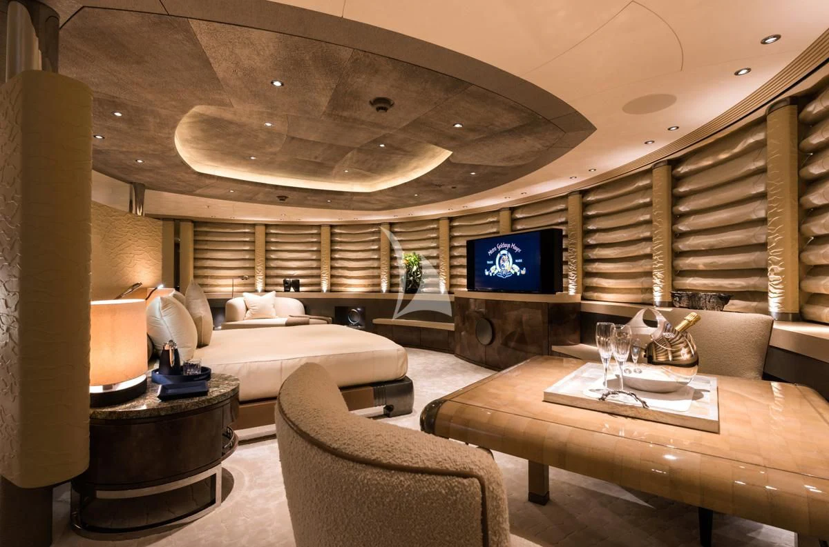 a room with a bed and a table aboard ROMEA Yacht for Sale