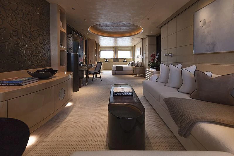 a living room with a couch and a desk aboard ROMEA Yacht for Sale