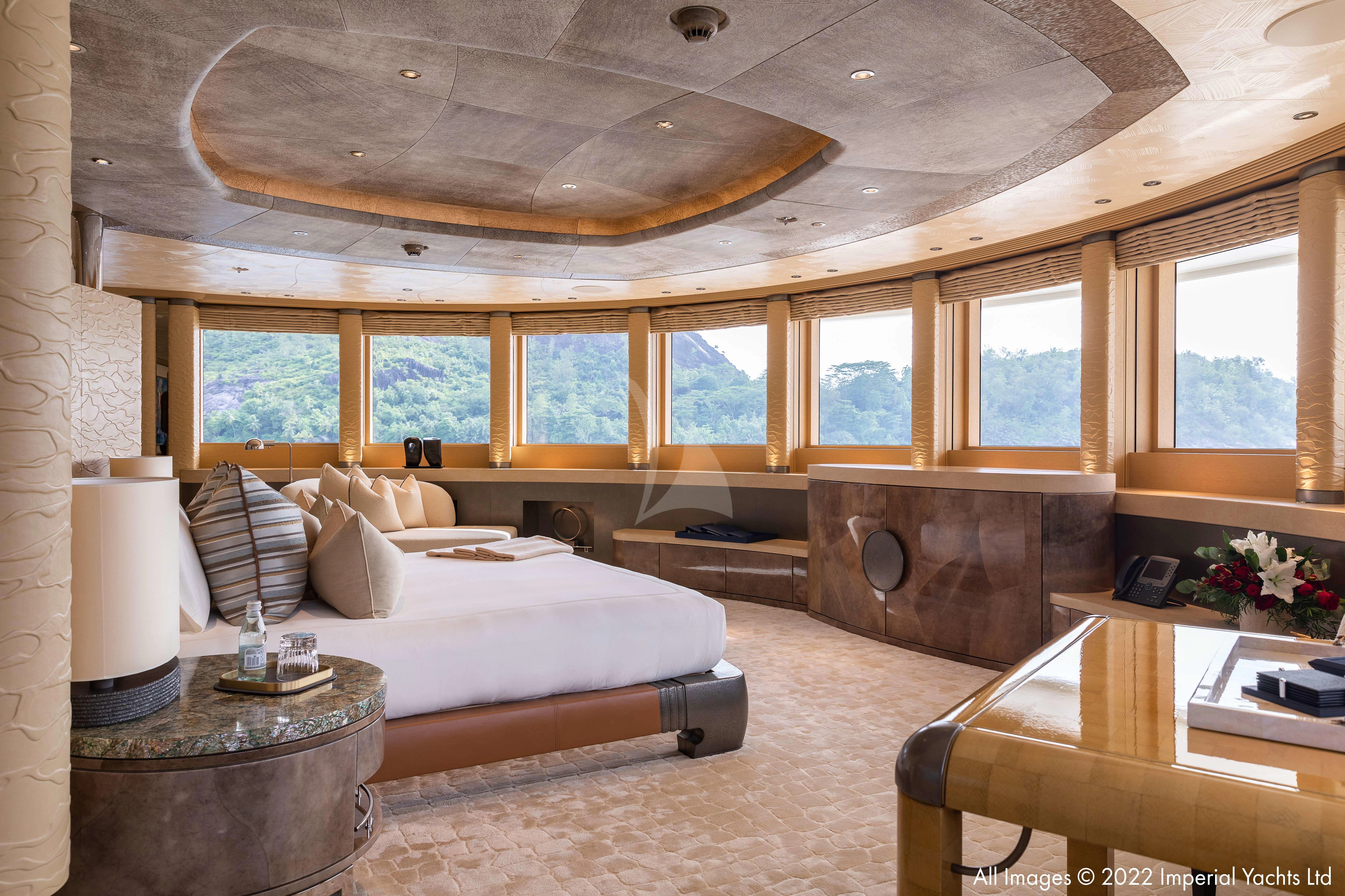 a room with a bed and a table aboard ROMEA Yacht for Sale