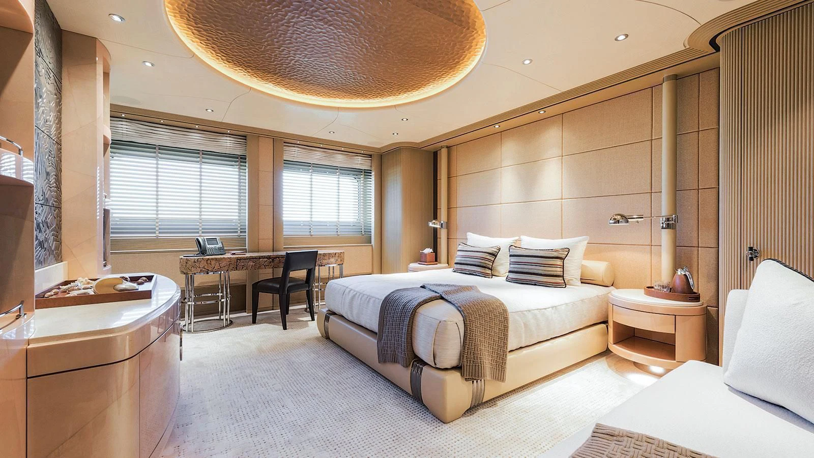 a room with a bed and a table aboard ROMEA Yacht for Sale