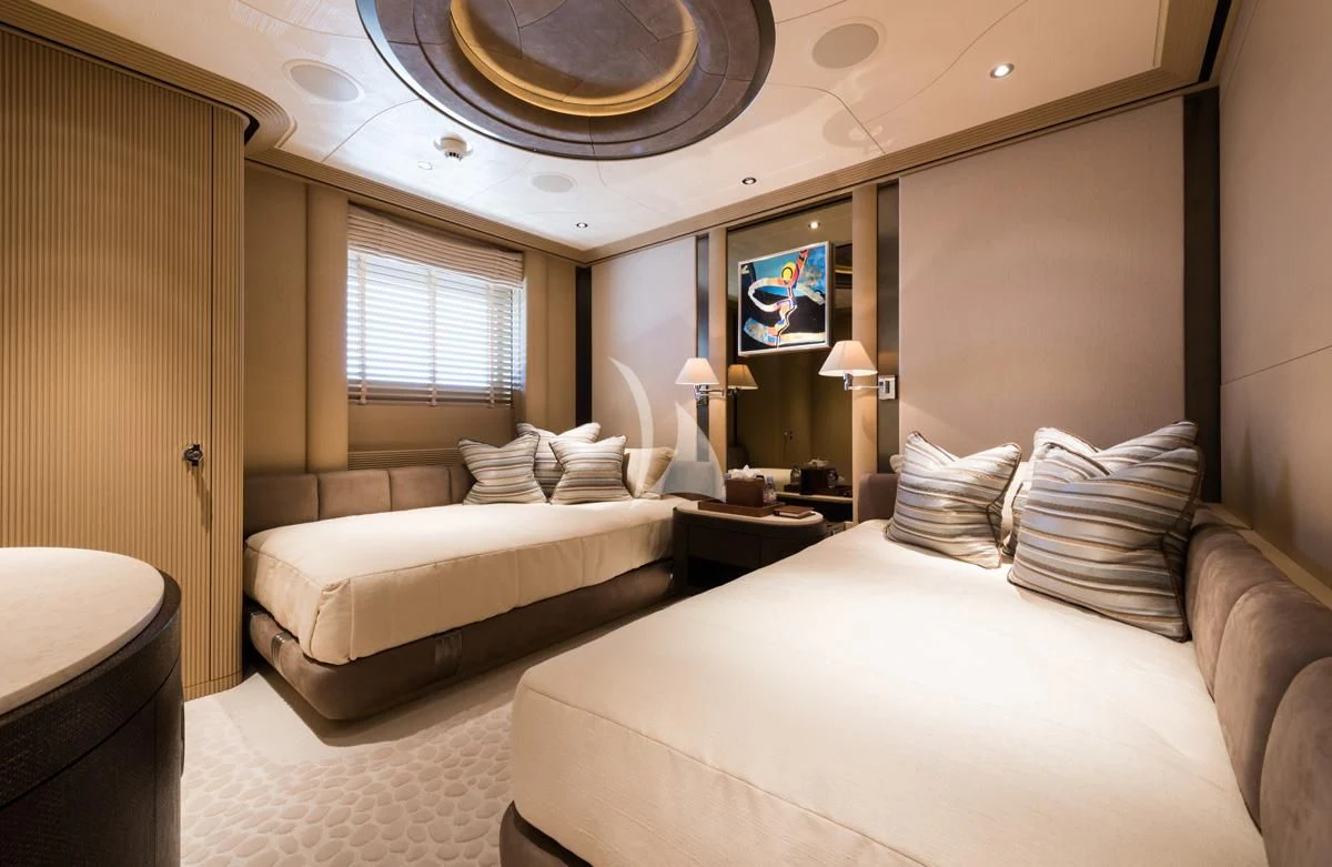 a room with two beds aboard ROMEA Yacht for Sale