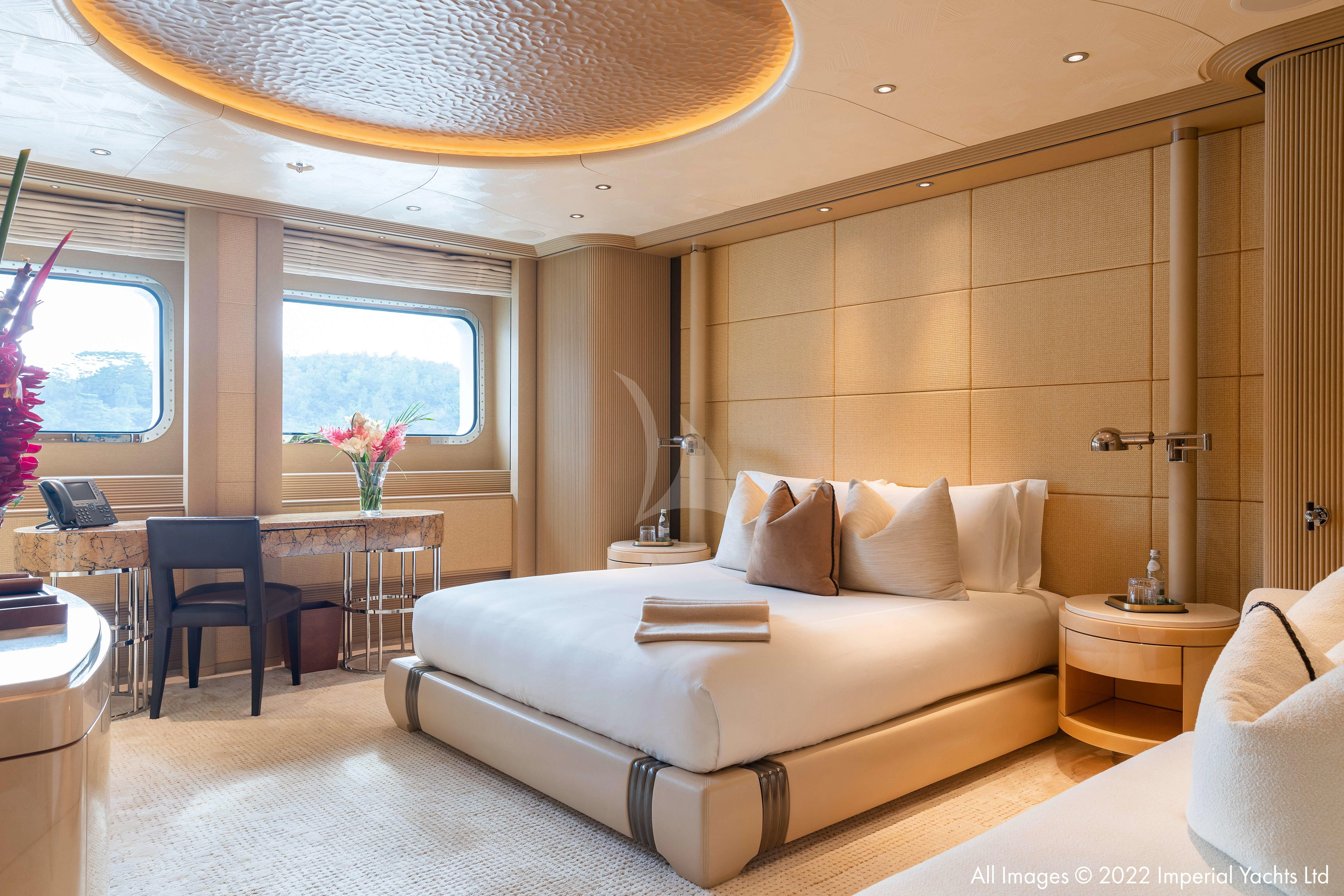 a large bed in a room aboard ROMEA Yacht for Sale