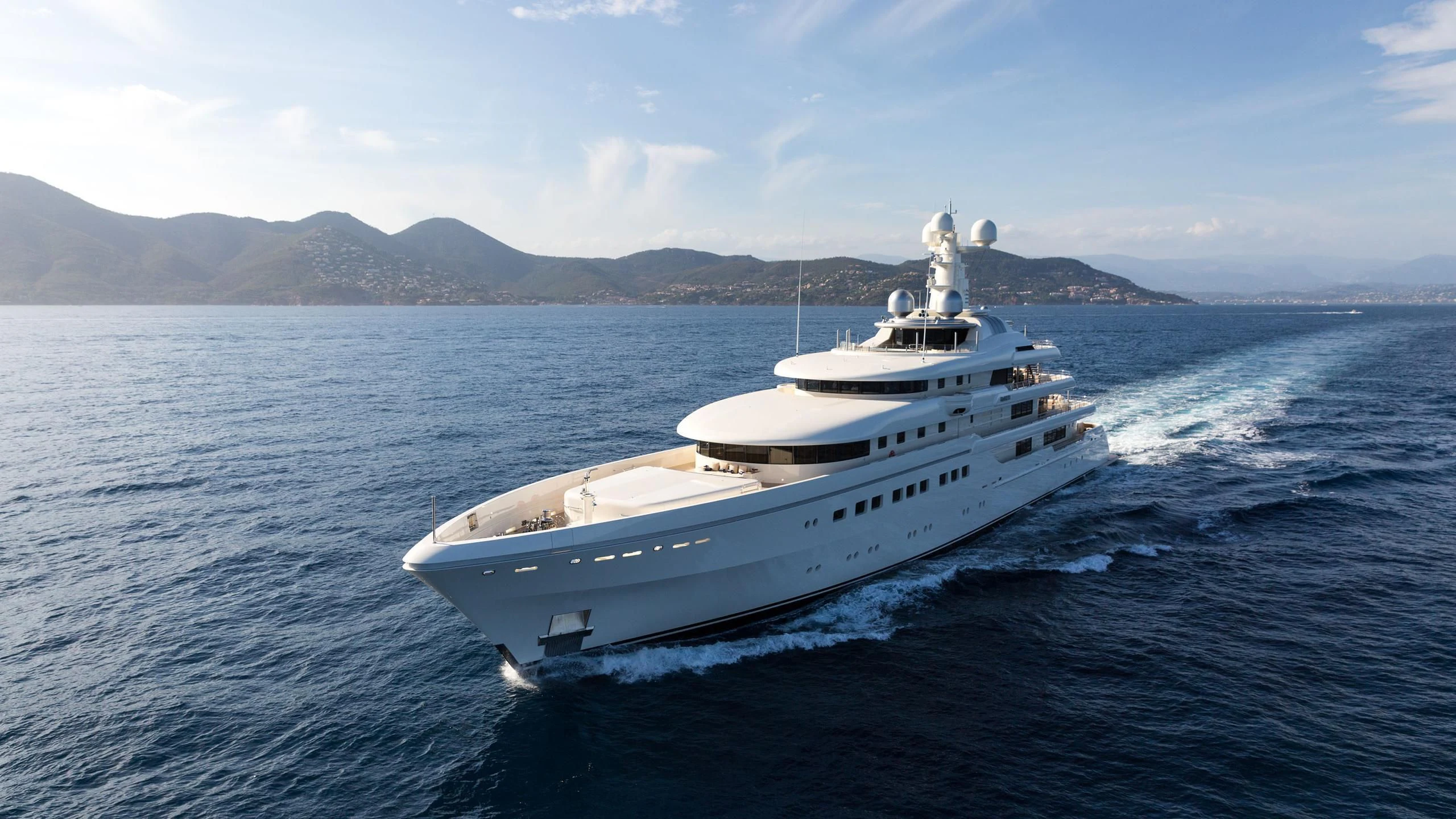 a white boat in the water aboard ROMEA Yacht for Sale