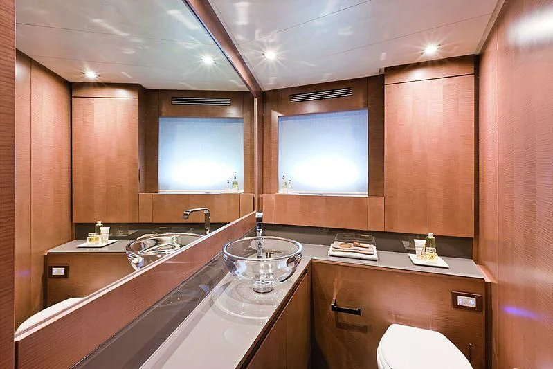a bathroom with a large window aboard LE CAPRICE IV Yacht for Sale