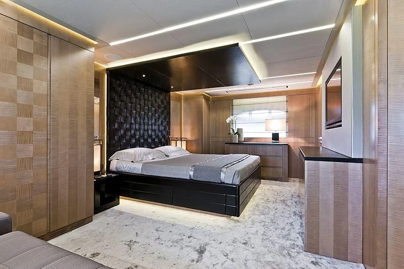 a large bedroom with a large bed aboard LE CAPRICE IV Yacht for Sale