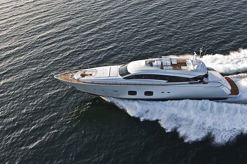 a white boat on water aboard LE CAPRICE IV Yacht for Sale