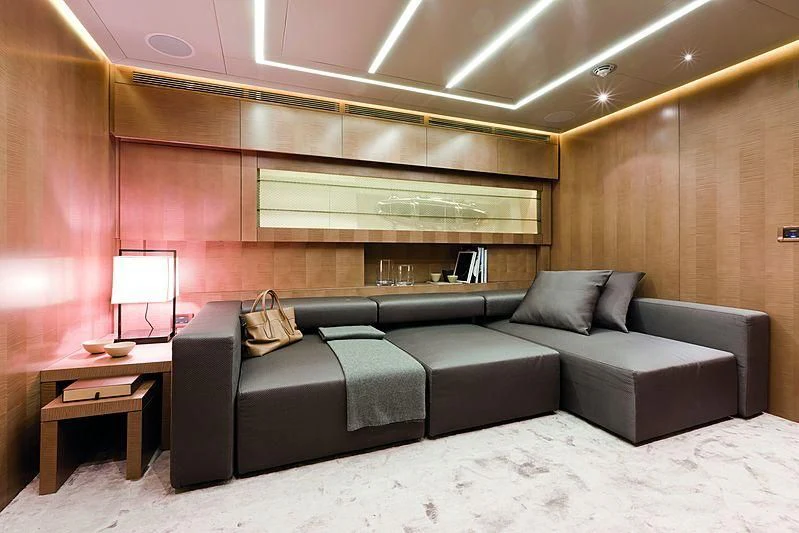 a couch in a room aboard LE CAPRICE IV Yacht for Sale