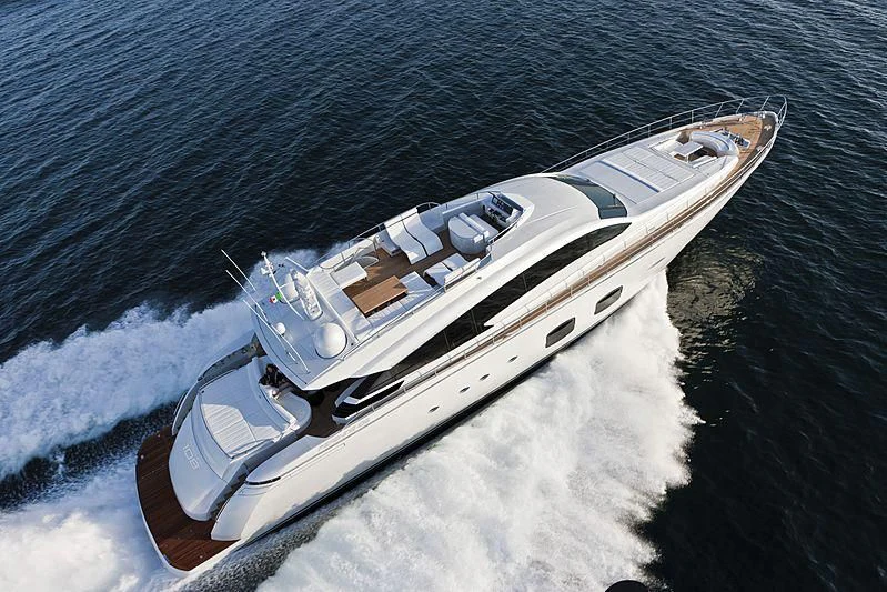 a white boat on water aboard LE CAPRICE IV Yacht for Sale