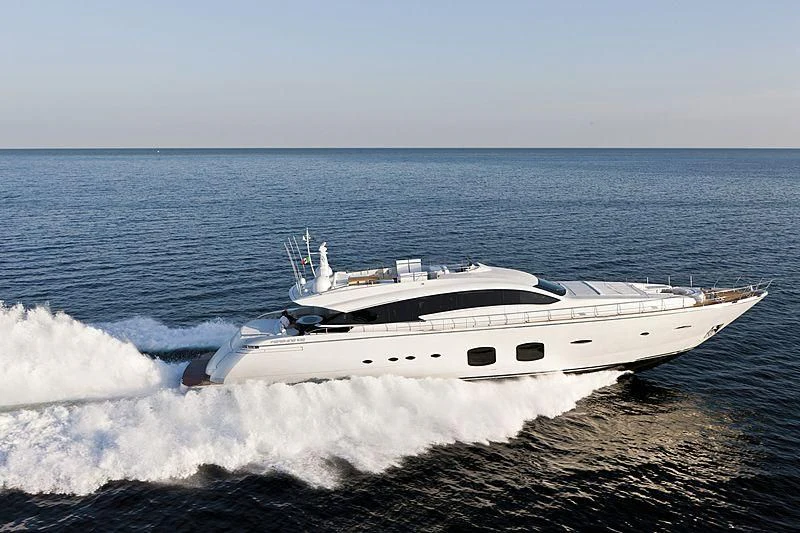 a white yacht on a beach aboard LE CAPRICE IV Yacht for Sale
