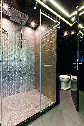 a bathroom with a shower aboard LE CAPRICE IV Yacht for Sale