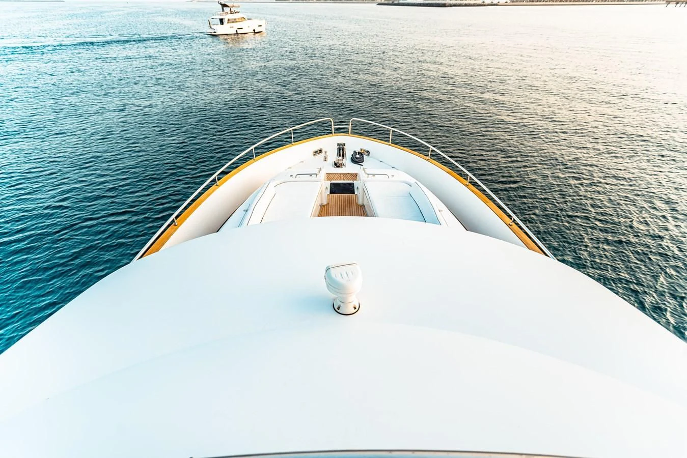 a white boat in the water aboard FAT BOY Yacht for Sale