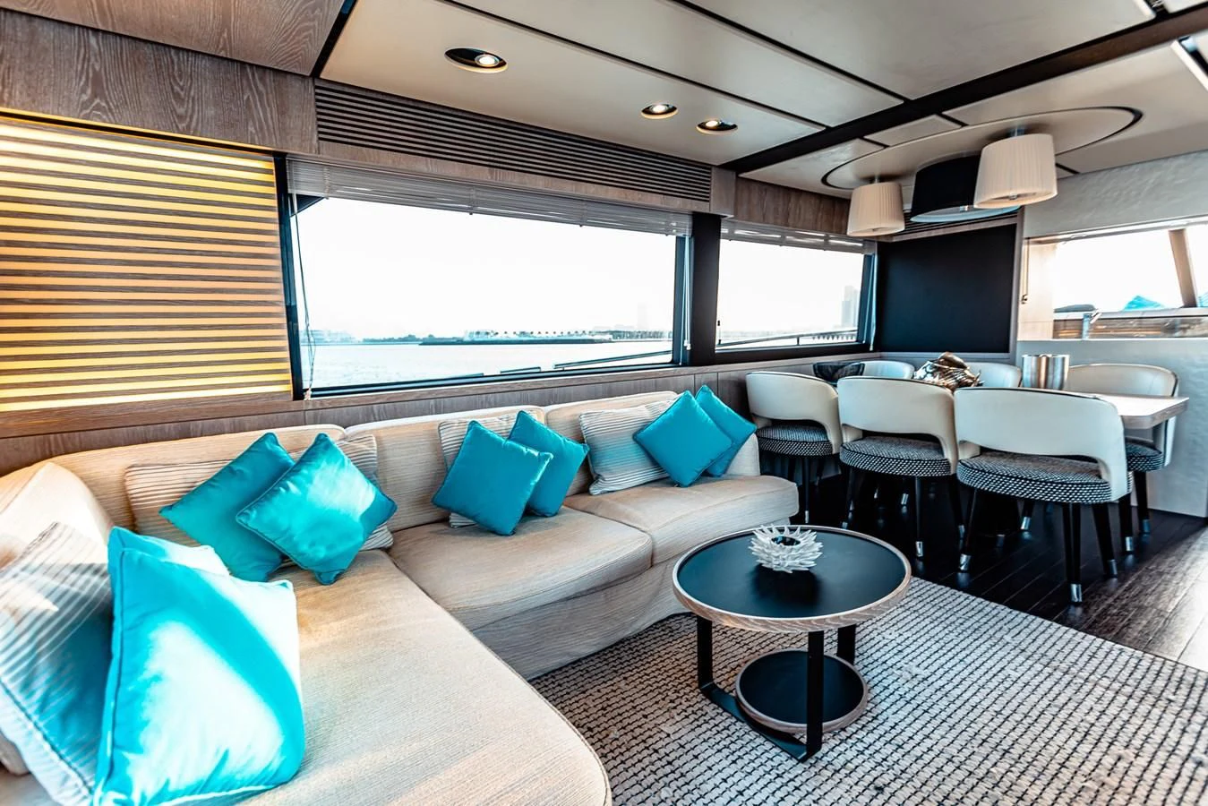 a large living room with a large window aboard FAT BOY Yacht for Sale