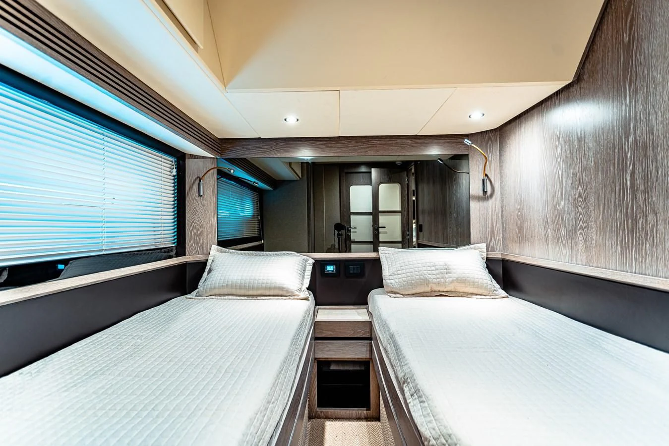 a room with two beds aboard FAT BOY Yacht for Sale