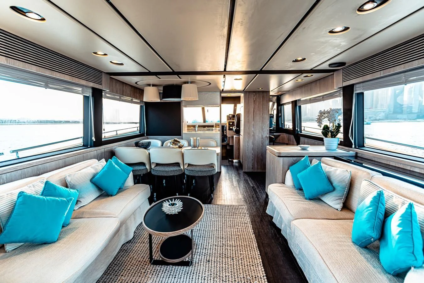 a large living room with a large window aboard FAT BOY Yacht for Sale