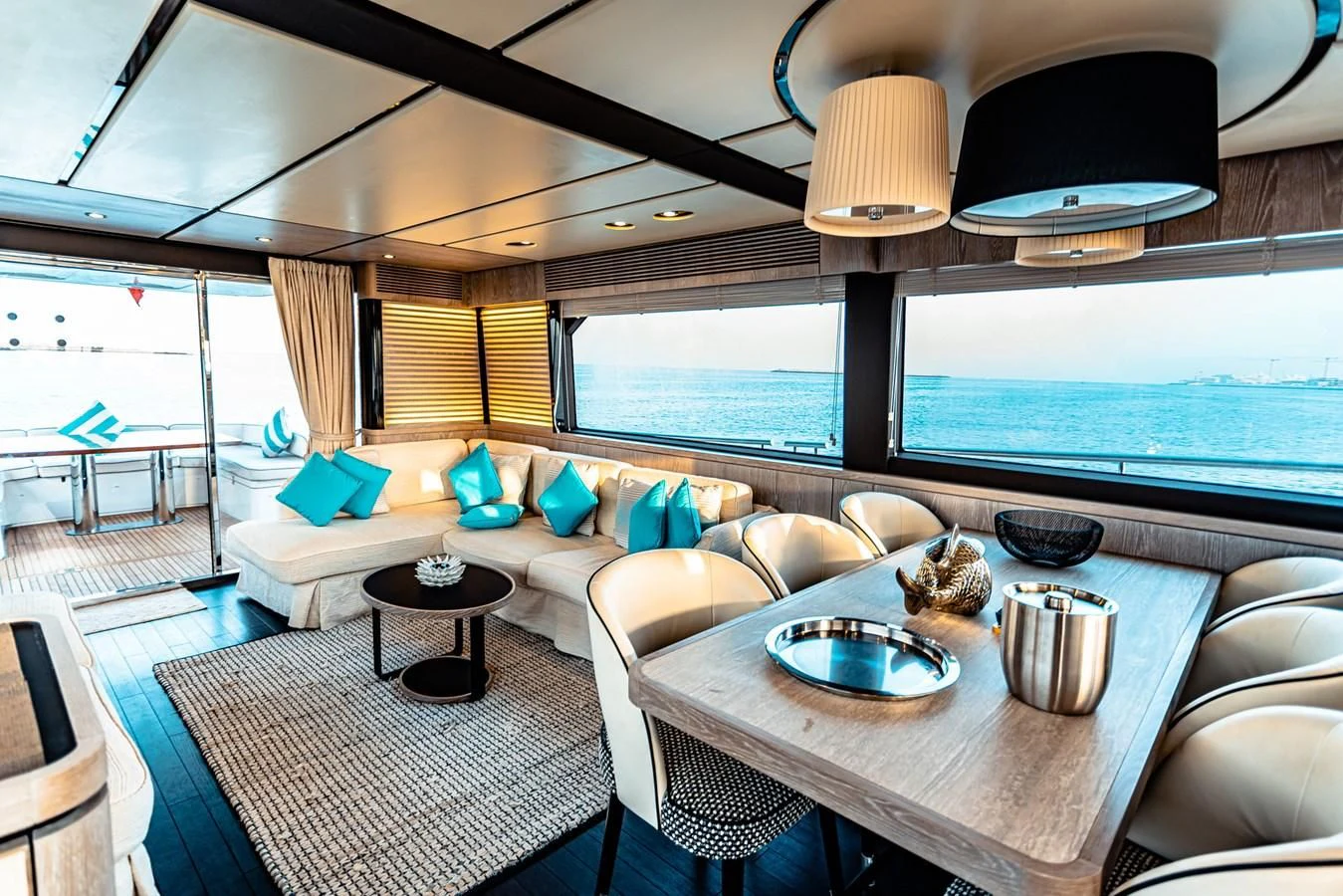 a living room with a large window aboard FAT BOY Yacht for Sale