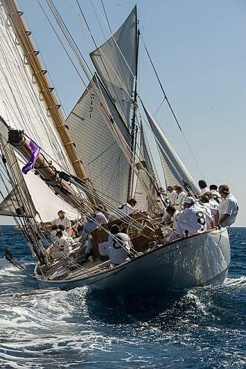 a group of people on a sailboat aboard MOONBEAM IV Yacht for Sale