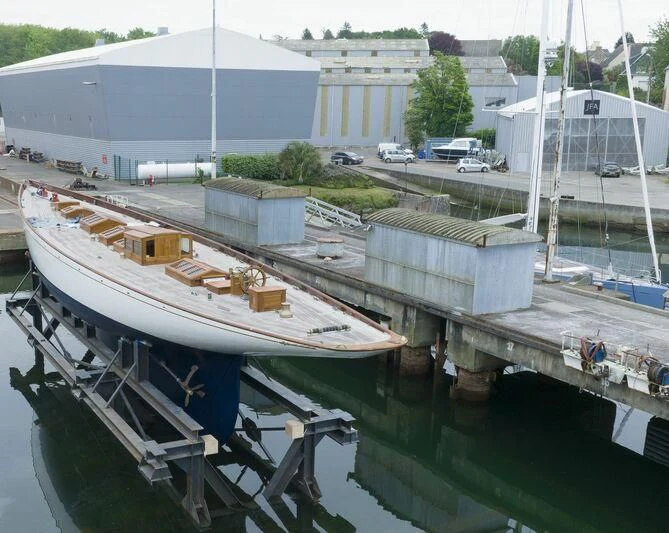 a boat docked at a dock aboard MOONBEAM IV Yacht for Sale