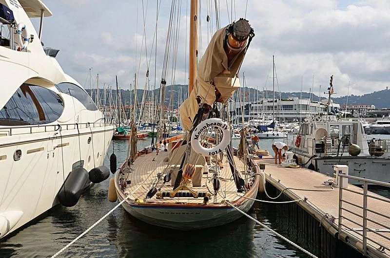a sailboat docked at a pier aboard MOONBEAM IV Yacht for Sale