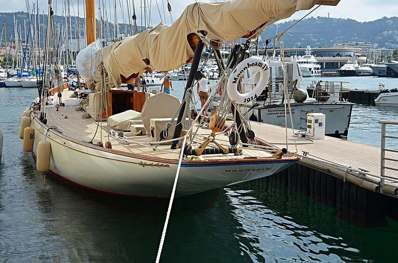 a boat docked at a pier aboard MOONBEAM IV Yacht for Sale