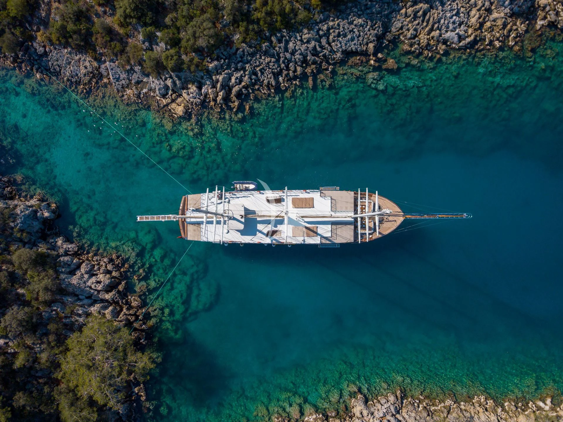 a house on a cliff above the ocean aboard ADMIRAL Yacht for Charter