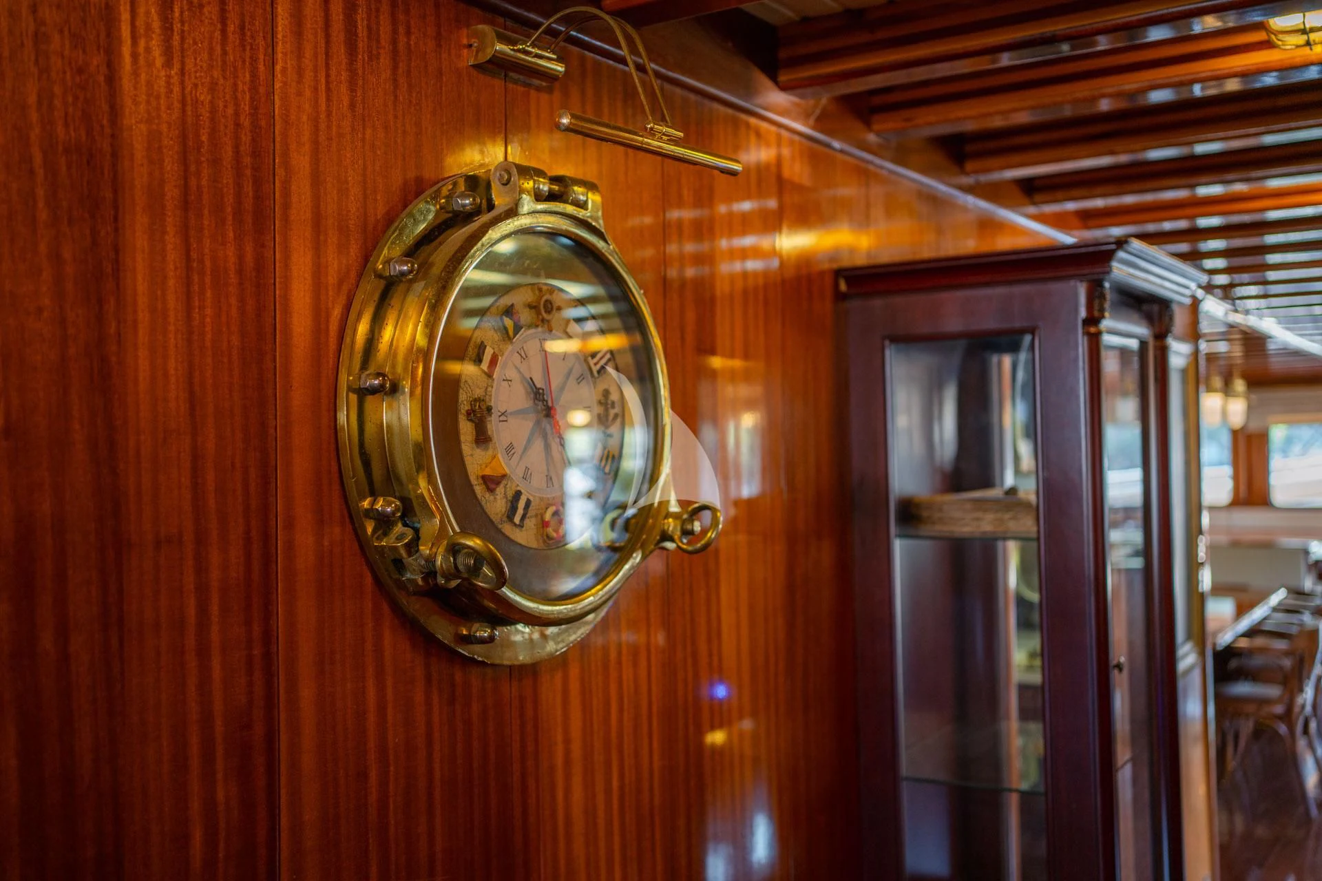 a clock from a ceiling aboard ADMIRAL Yacht for Charter