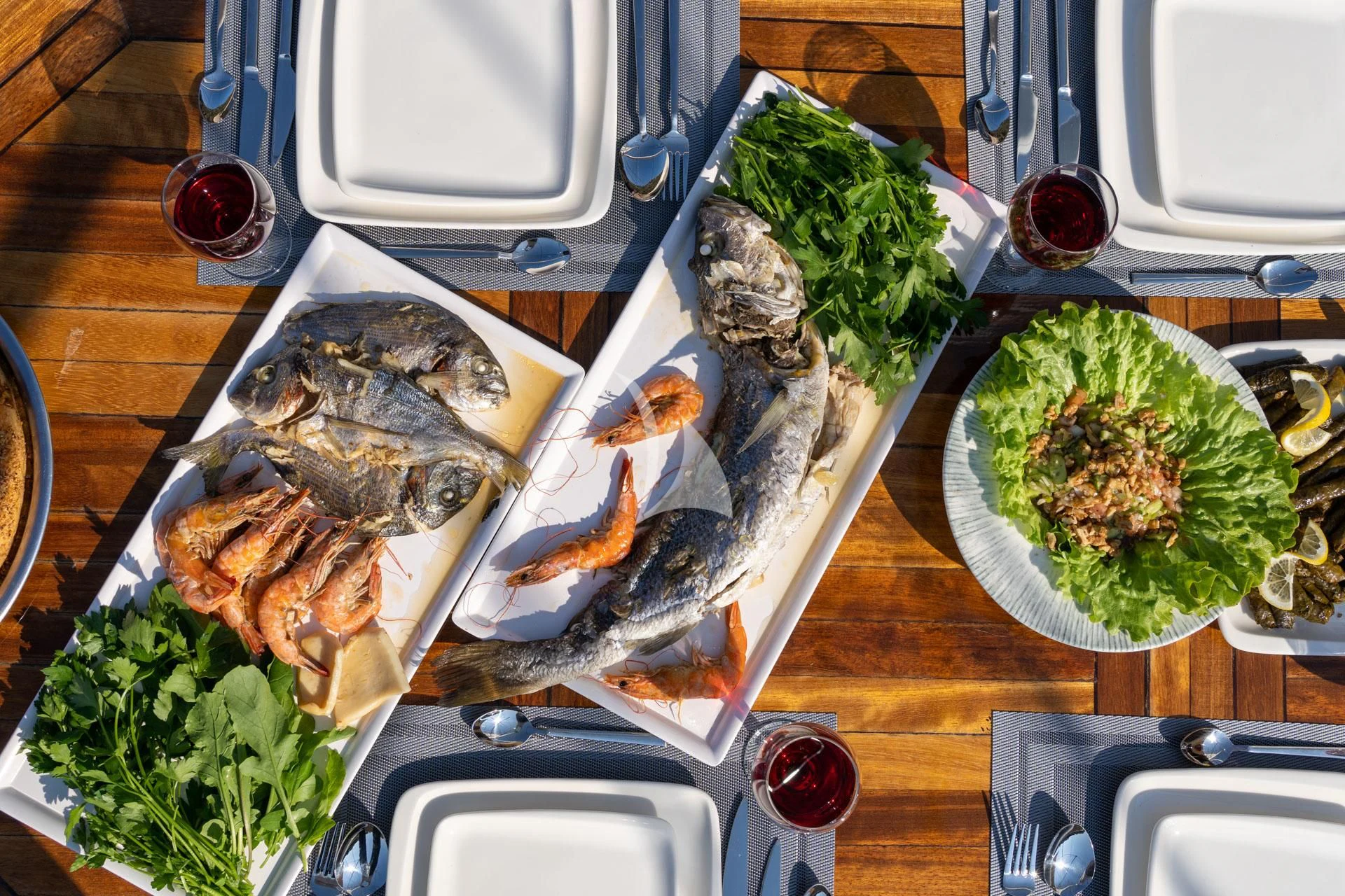 a tray of food aboard ADMIRAL Yacht for Charter