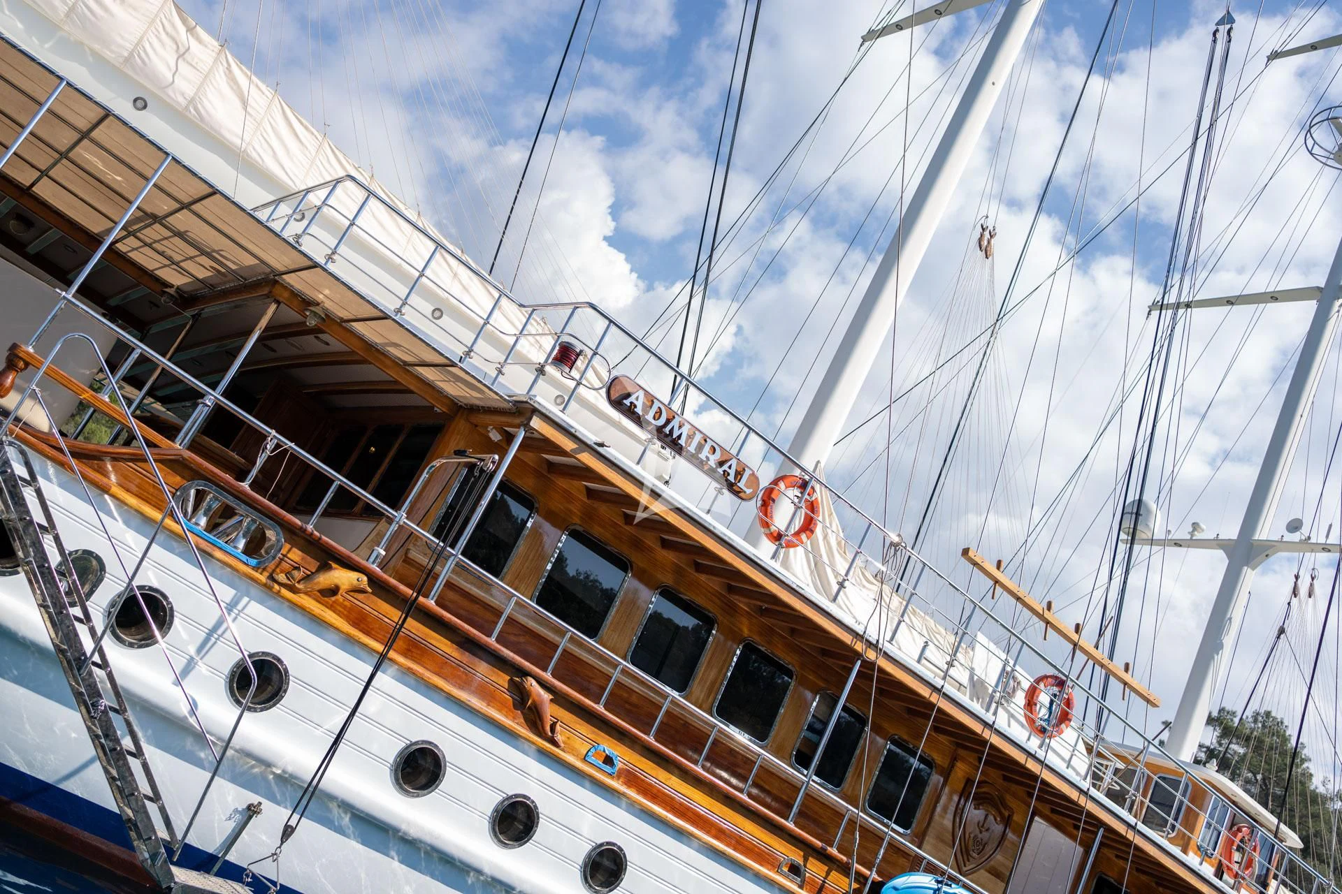 a large boat with a large sail aboard ADMIRAL Yacht for Charter