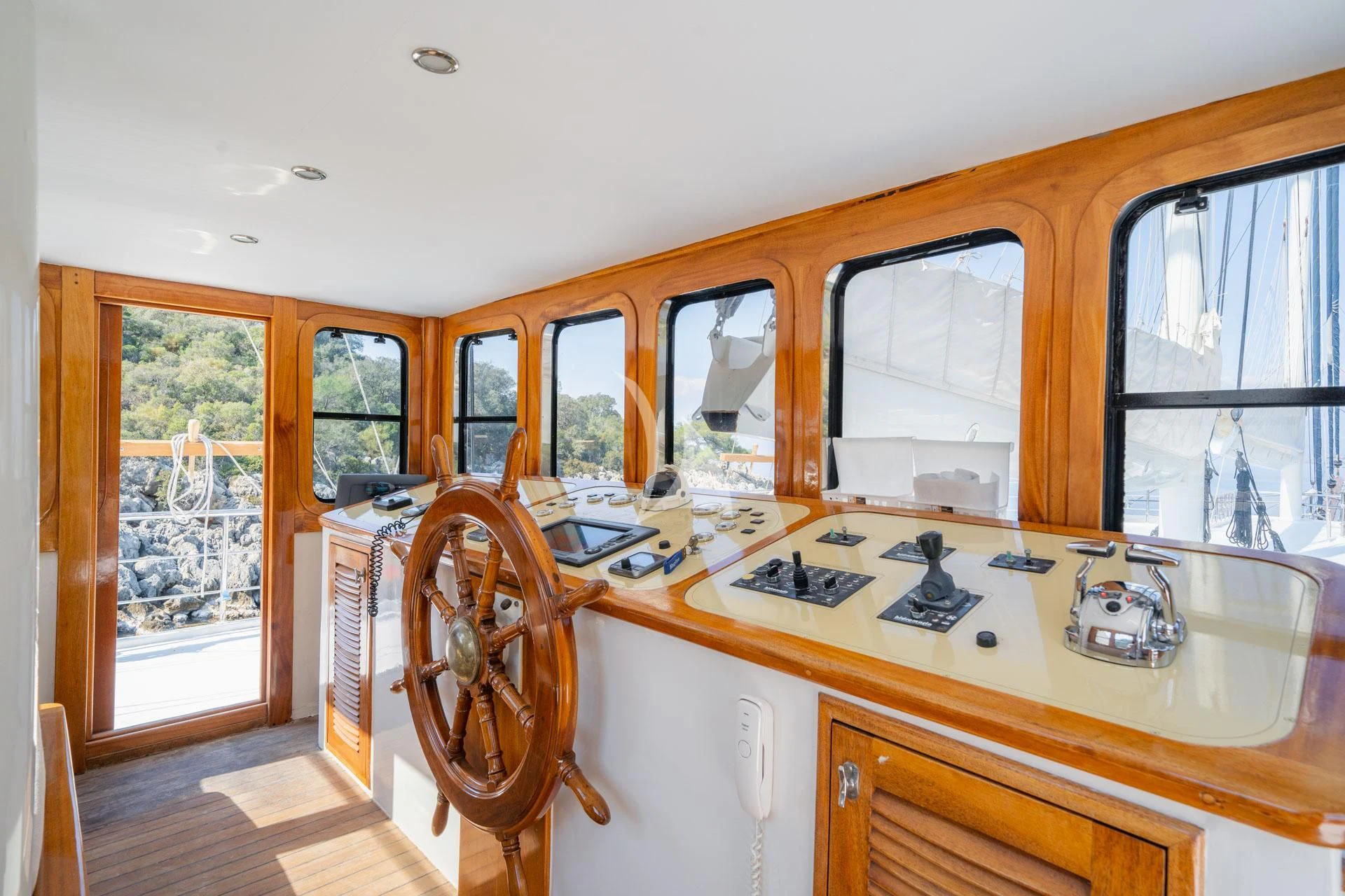 a kitchen with a stove and cabinets aboard ADMIRAL Yacht for Charter
