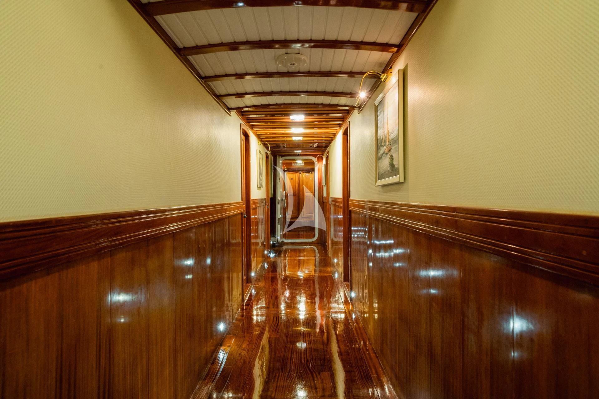a hallway with wood floors aboard ADMIRAL Yacht for Charter