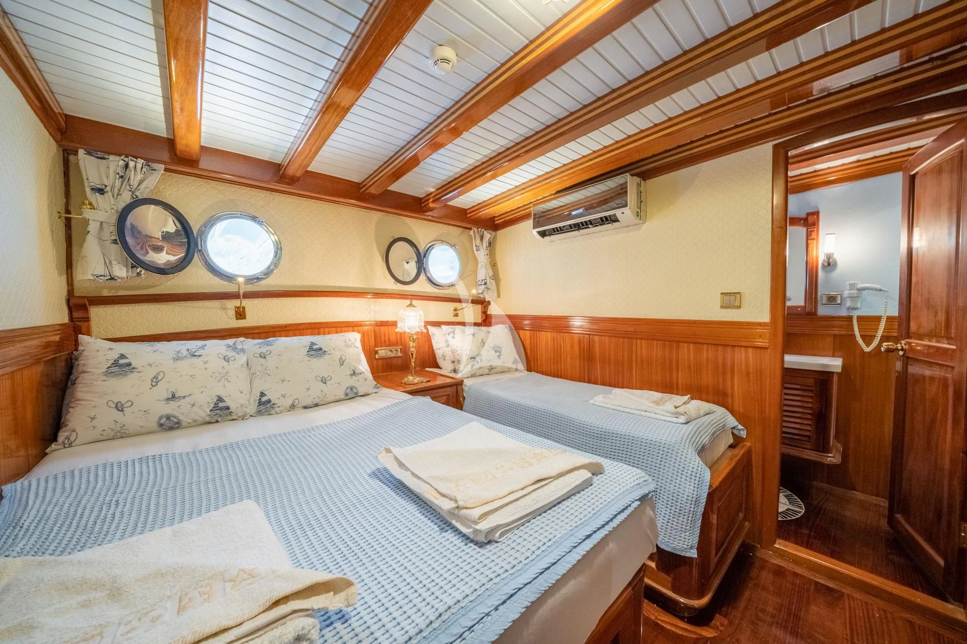 a room with two beds aboard ADMIRAL Yacht for Charter