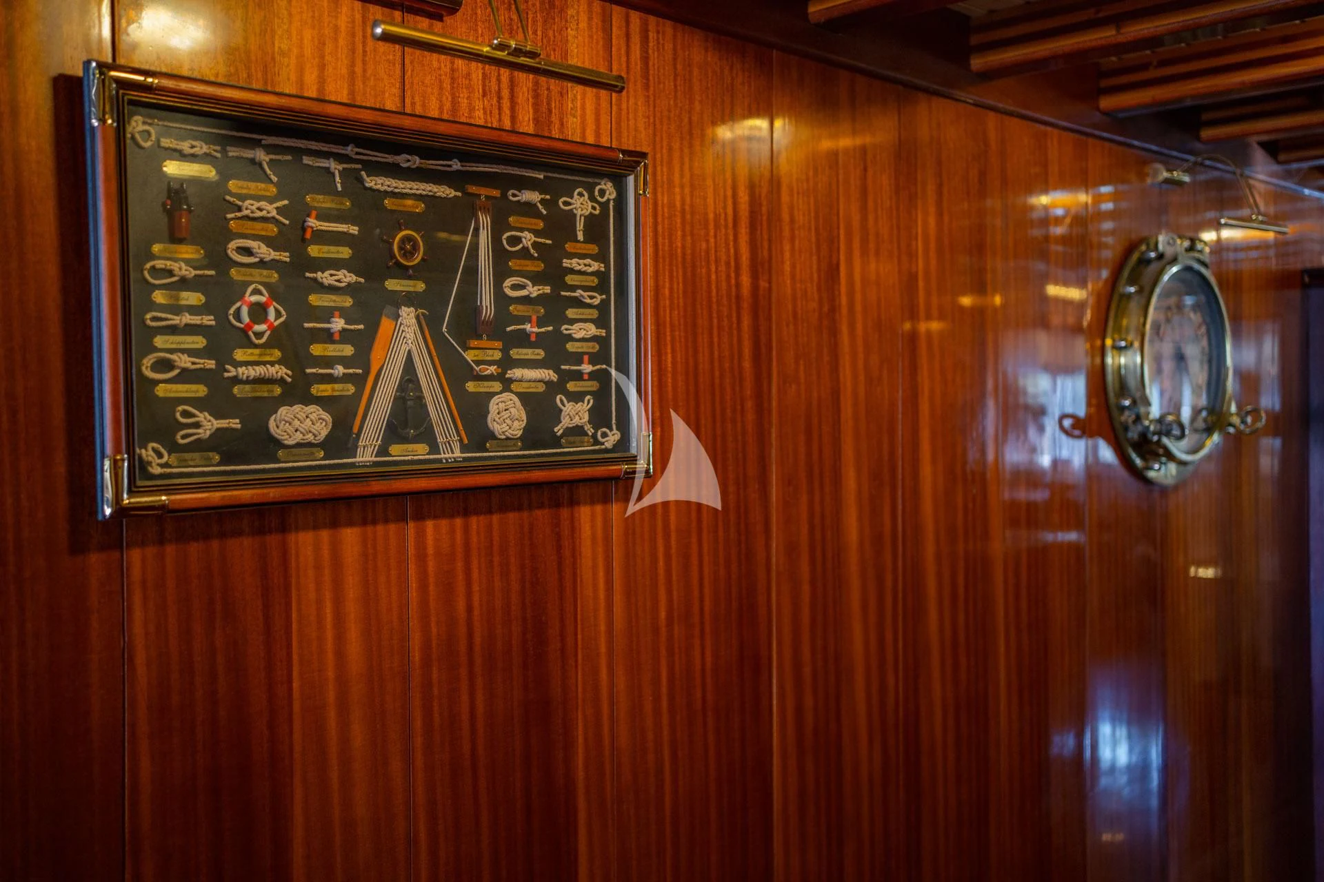 a plaque on a wall aboard ADMIRAL Yacht for Charter