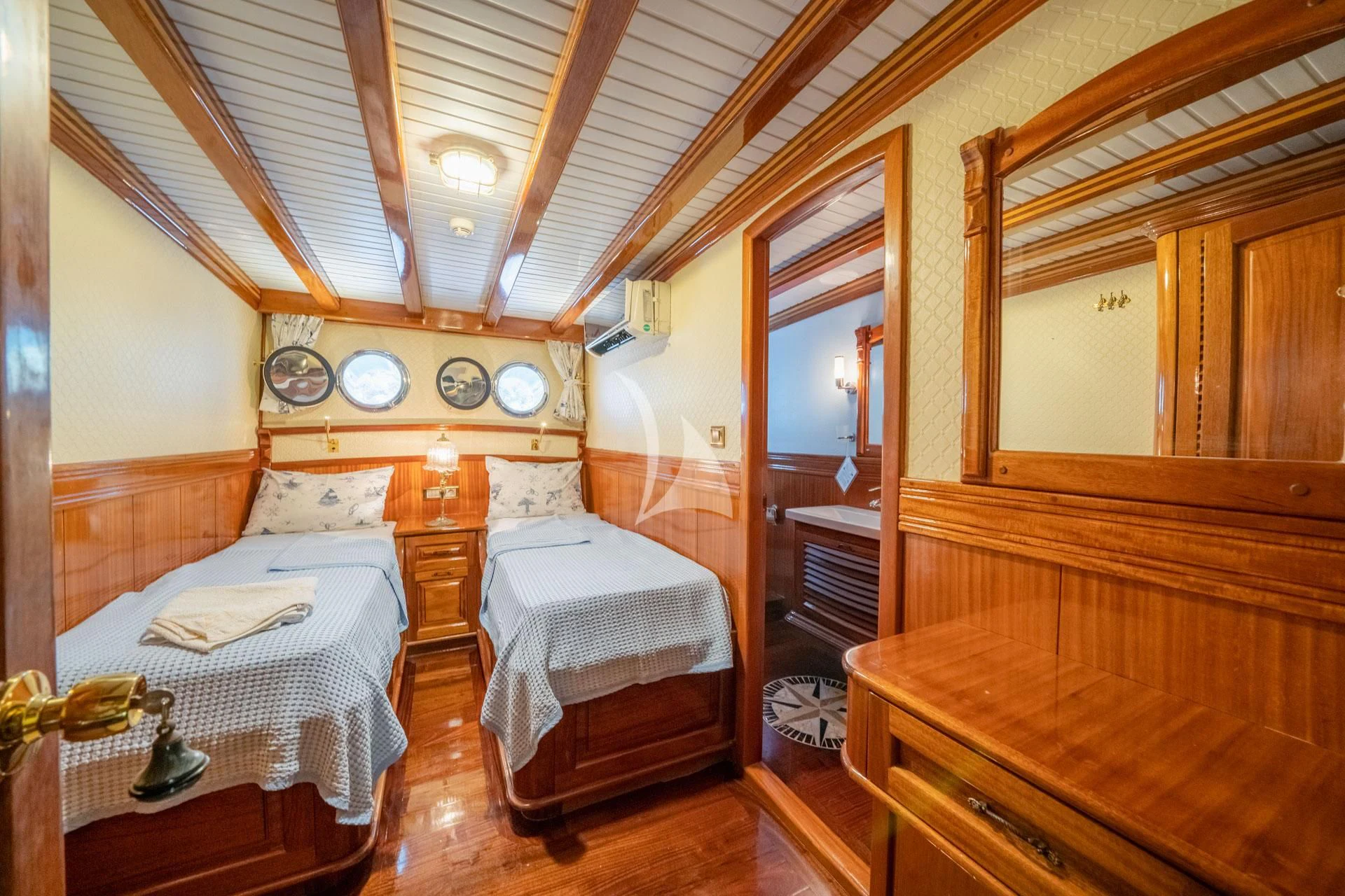a bedroom with two beds aboard ADMIRAL Yacht for Charter