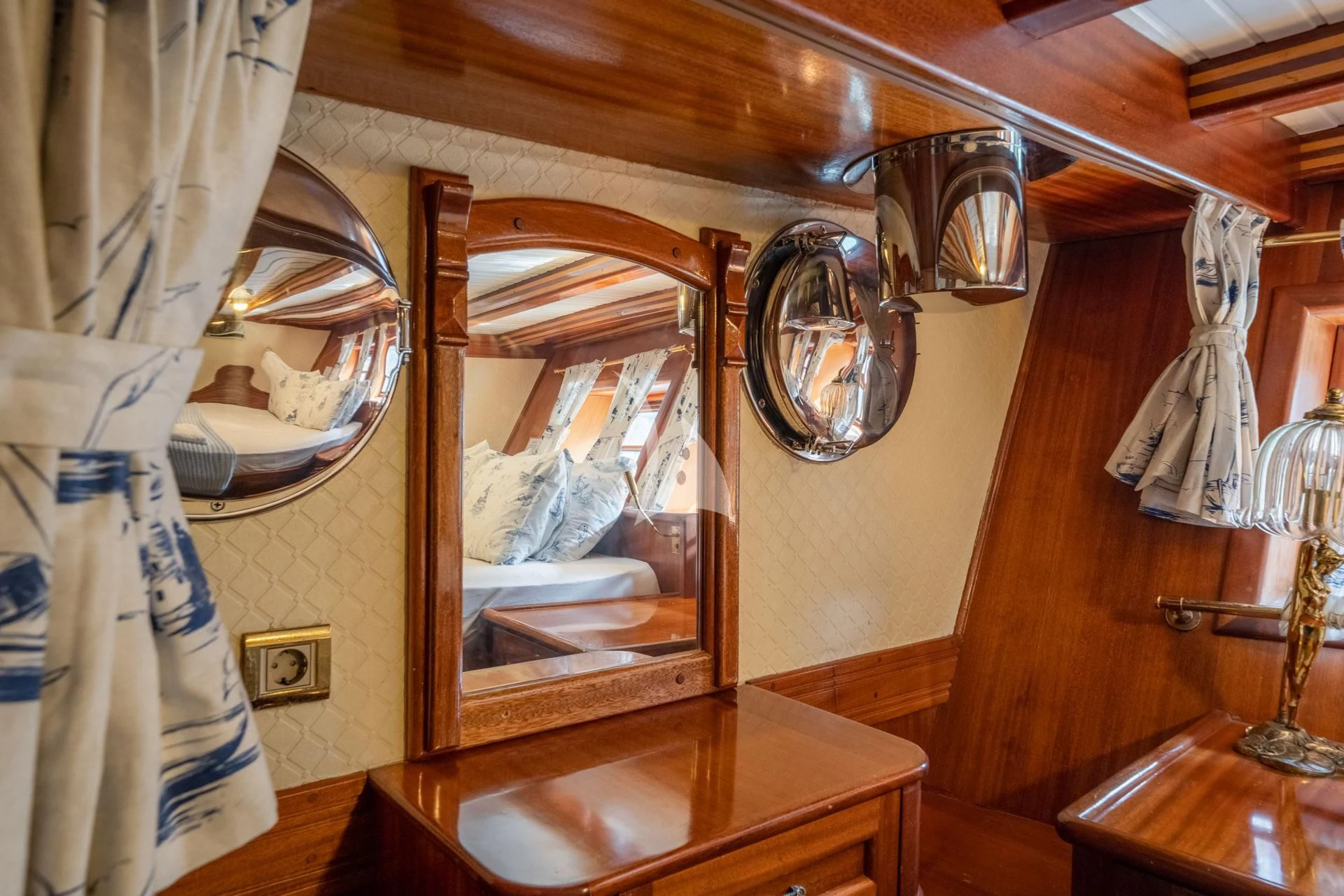 a mirror on a wall aboard ADMIRAL Yacht for Charter