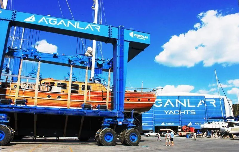a large container ship aboard TAKE IT EASIER Yacht for Sale
