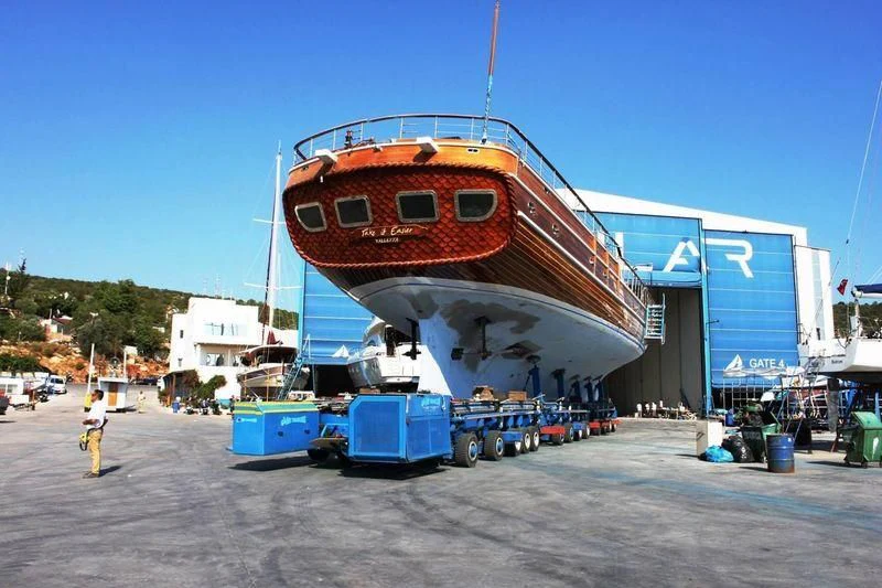 a large boat docked aboard TAKE IT EASIER Yacht for Sale