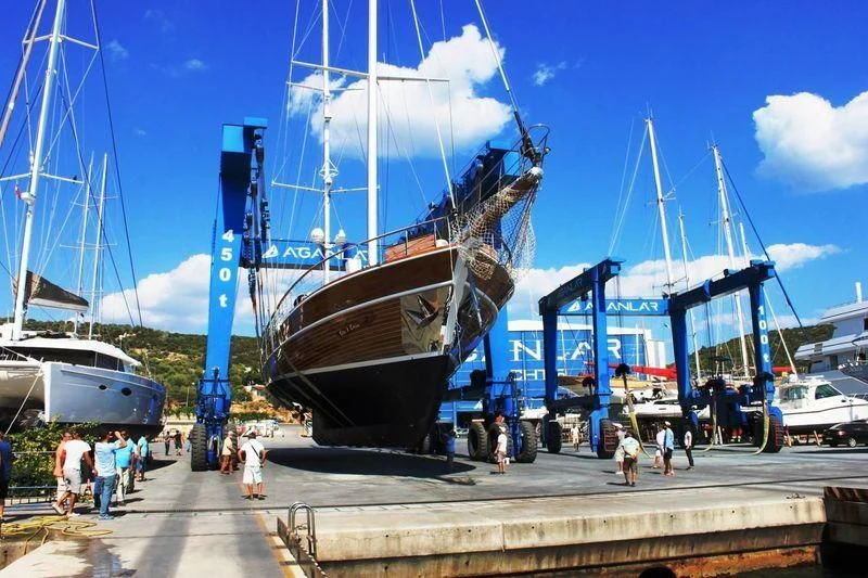 a large ship docked aboard TAKE IT EASIER Yacht for Sale