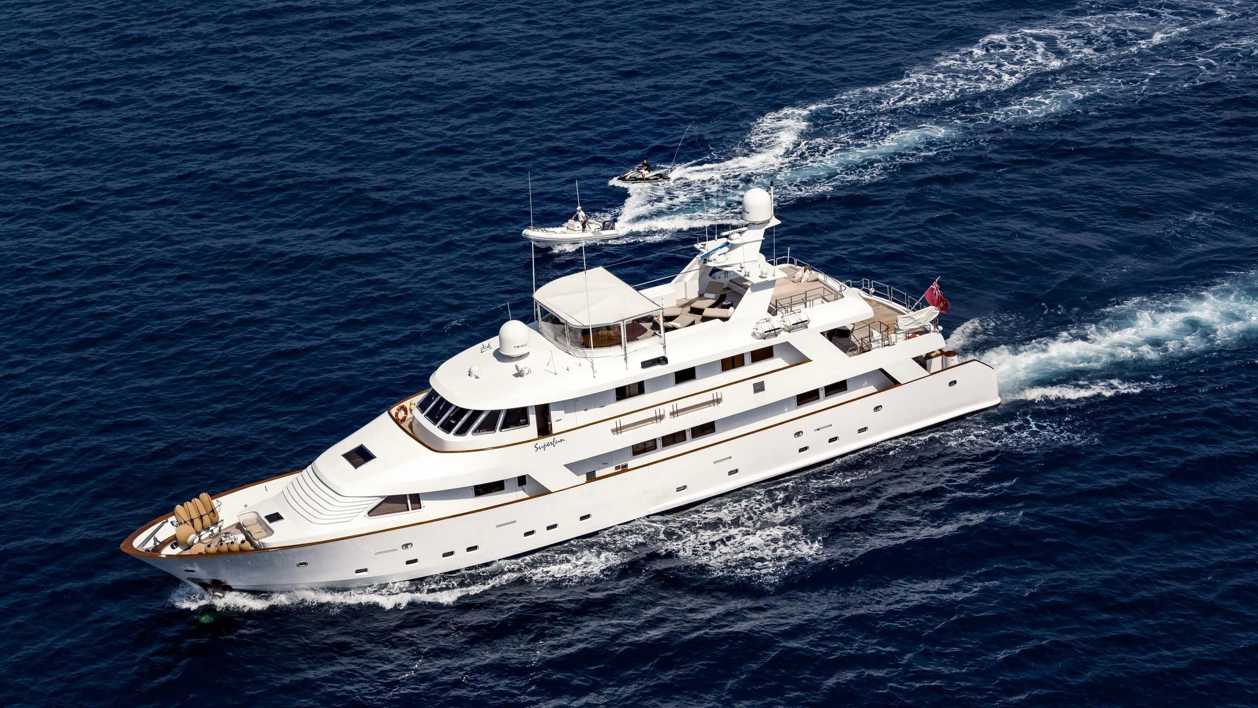 a large white ship aboard SUPERMAX Yacht for Sale