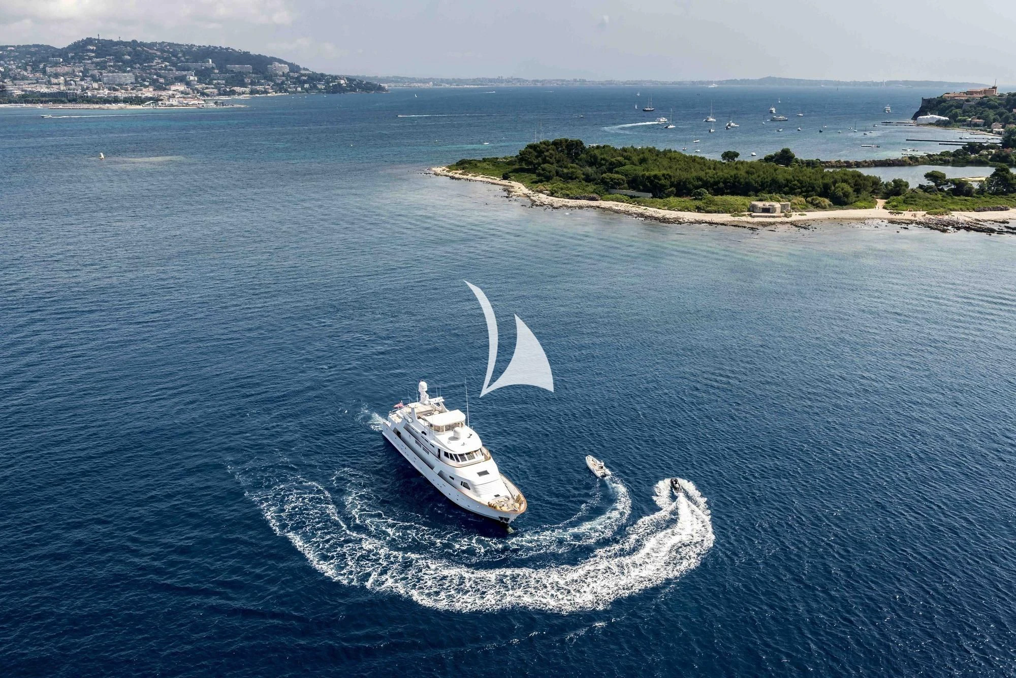a boat on the water aboard SUPERMAX Yacht for Sale
