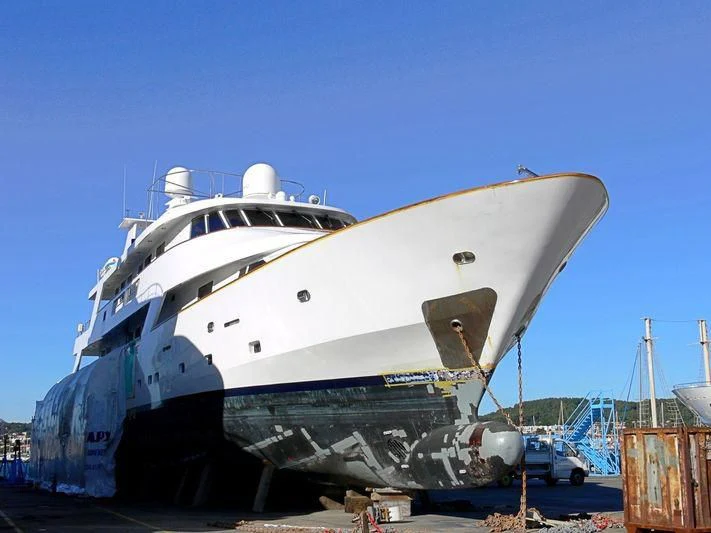 a large white boat aboard SUPERMAX Yacht for Sale