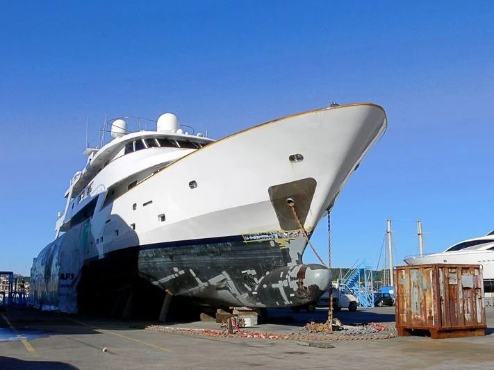 a large boat on the beach aboard SUPERMAX Yacht for Sale