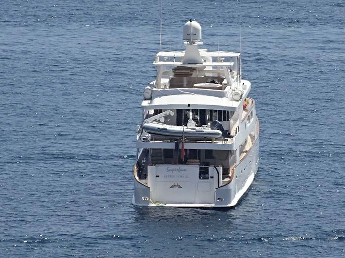 a boat in the water aboard SUPERMAX Yacht for Sale