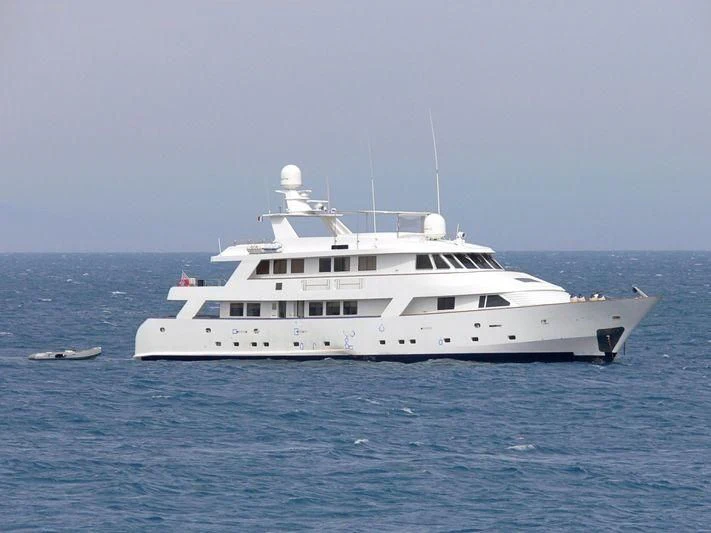 a white yacht in the water aboard SUPERMAX Yacht for Sale