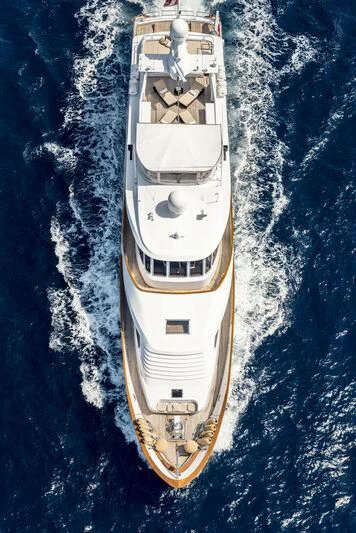 a space ship on a blue surface aboard SUPERMAX Yacht for Sale