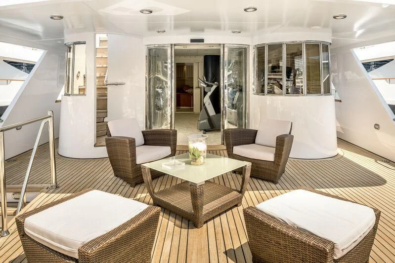 a modern looking living room aboard SUPERMAX Yacht for Sale