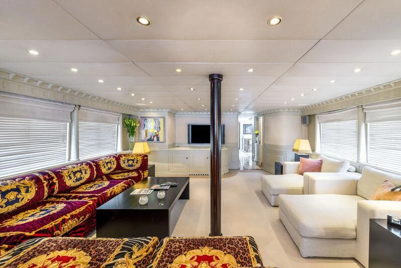 a living room with a large window aboard SUPERMAX Yacht for Sale