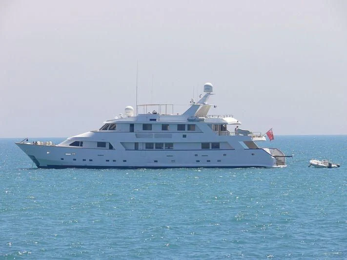 a large white boat in the water aboard SUPERMAX Yacht for Sale