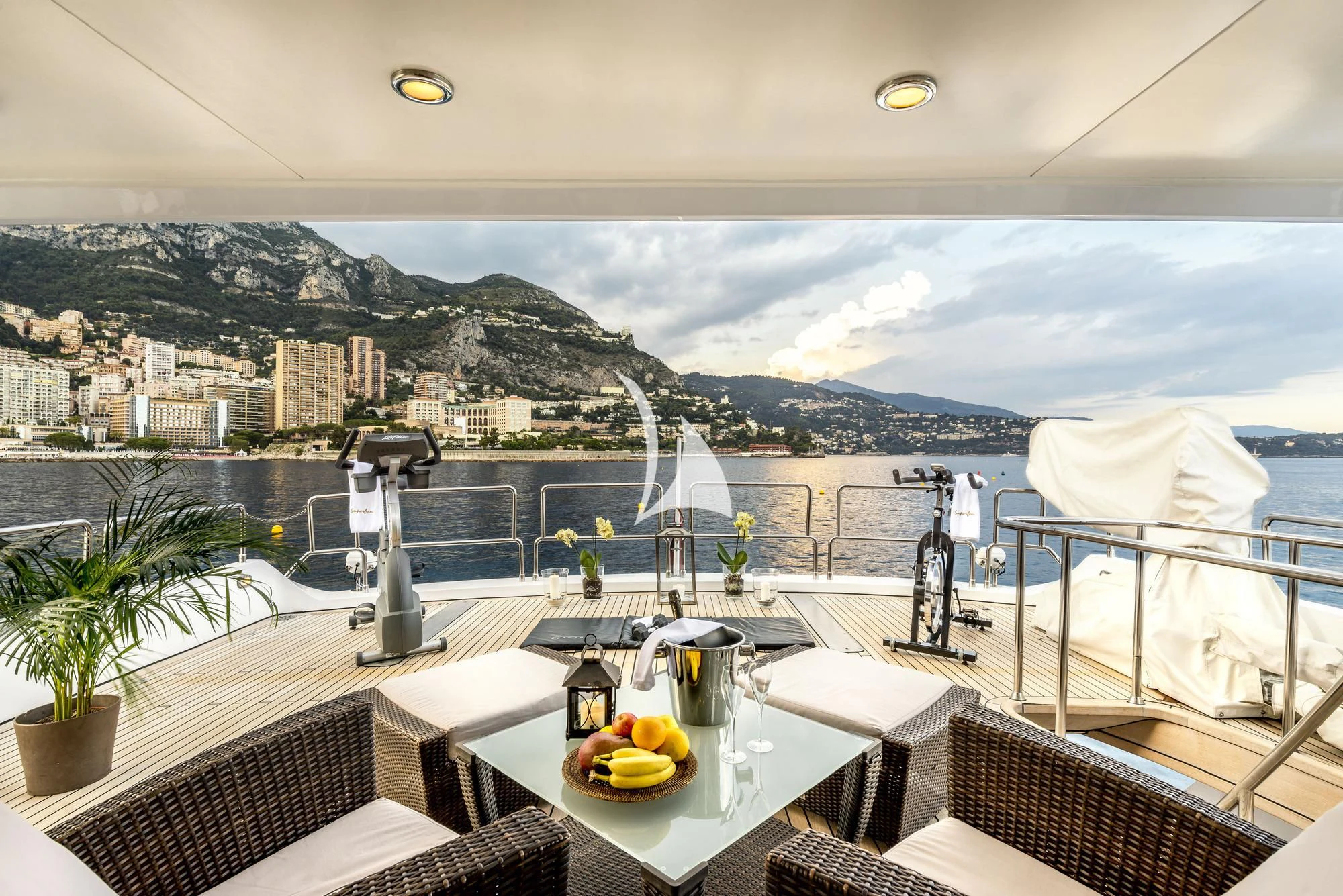 a balcony overlooking a city aboard SUPERMAX Yacht for Sale