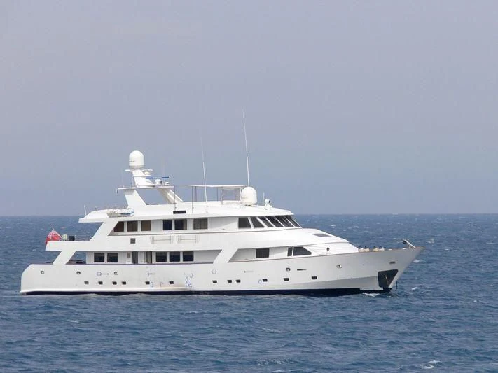 a white yacht in the water aboard SUPERMAX Yacht for Sale