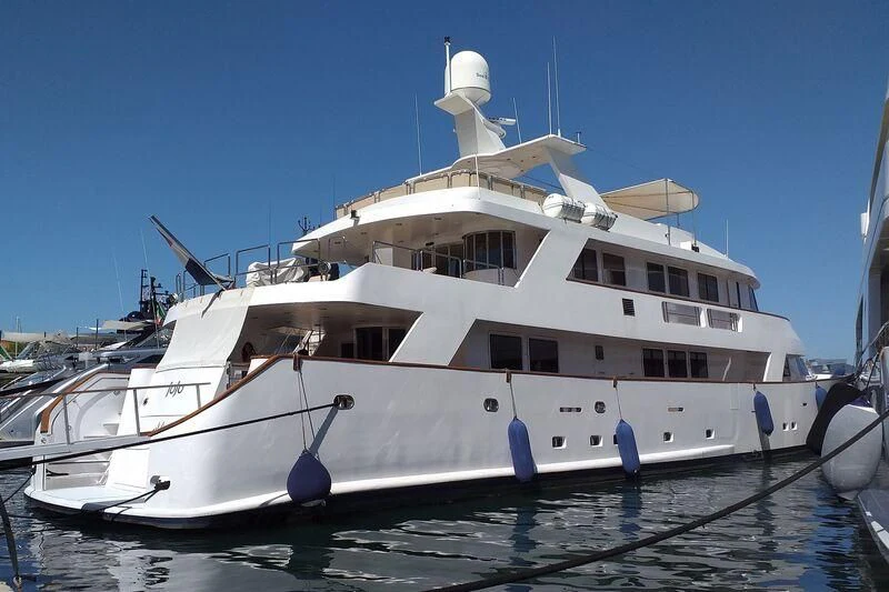 a large white boat aboard SUPERMAX Yacht for Sale