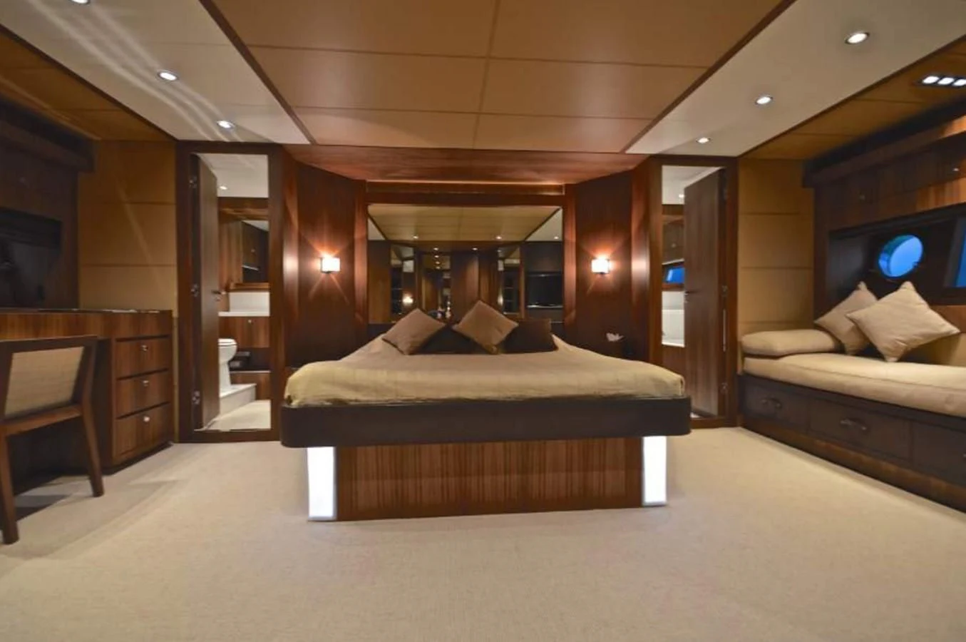 a large bed in a hotel room aboard TAURUS Yacht for Sale